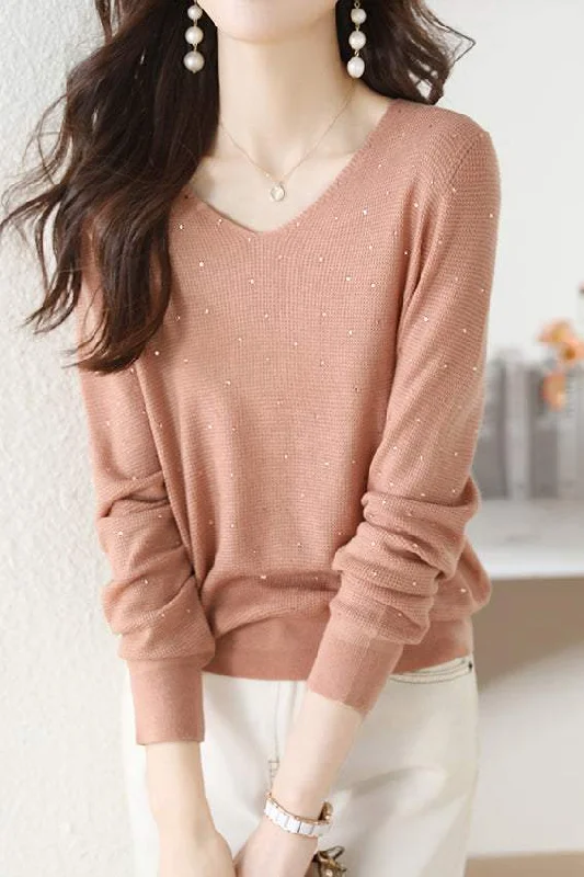 High-Quality Wool SweatersV-neck knitted sweater with hot-fixed rhinestones.