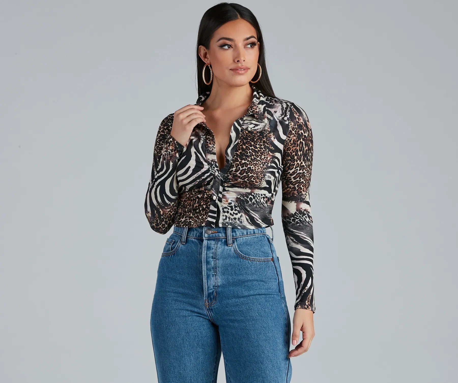 women's tops for those who want to stay on top of the latest fashion trends and wear pieces that are both stylish and on-trendWild Thing Animal Print Top