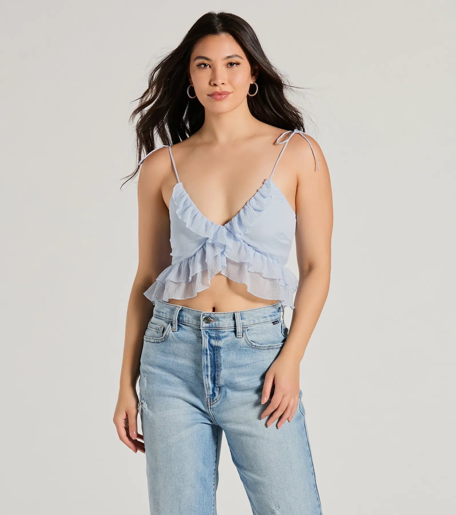 women's tops for those who want to add a bit of flair and personality to their looksFlirty Flounce V-Neck Ruffled Crop Top