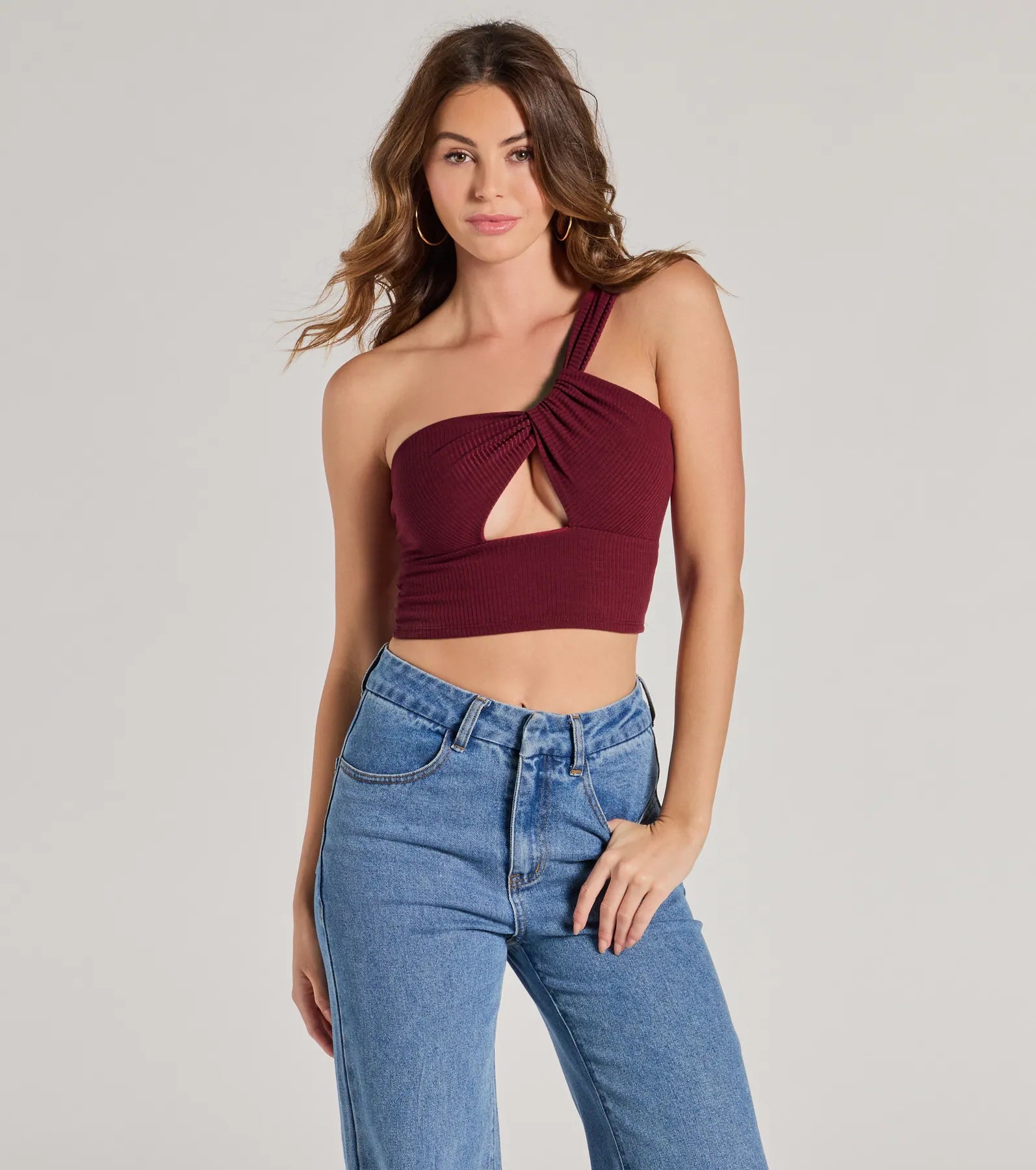 women's tops for those who want to wear pieces that are both comfortable and stylishHere To Slay One-Shoulder Cutout Knit Crop Top