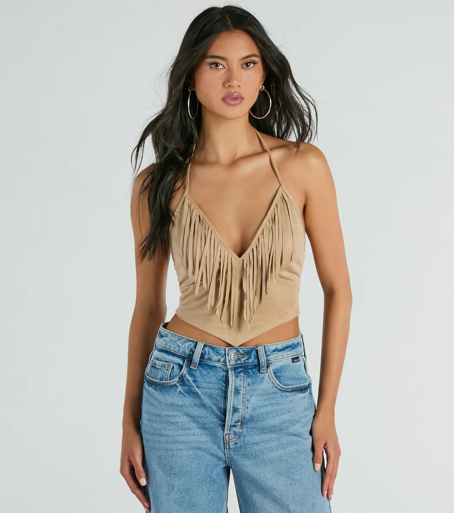 women's tops for those who want to add a touch of sophistication to their casual attireFestive Icon V-Neck Fringe Halter Faux Suede Crop Top